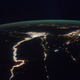 Illustration for article titled Holy crap! Why is the Earth glowing green?